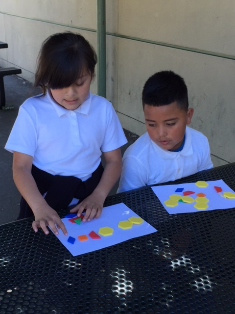 Two students working on a math activity
